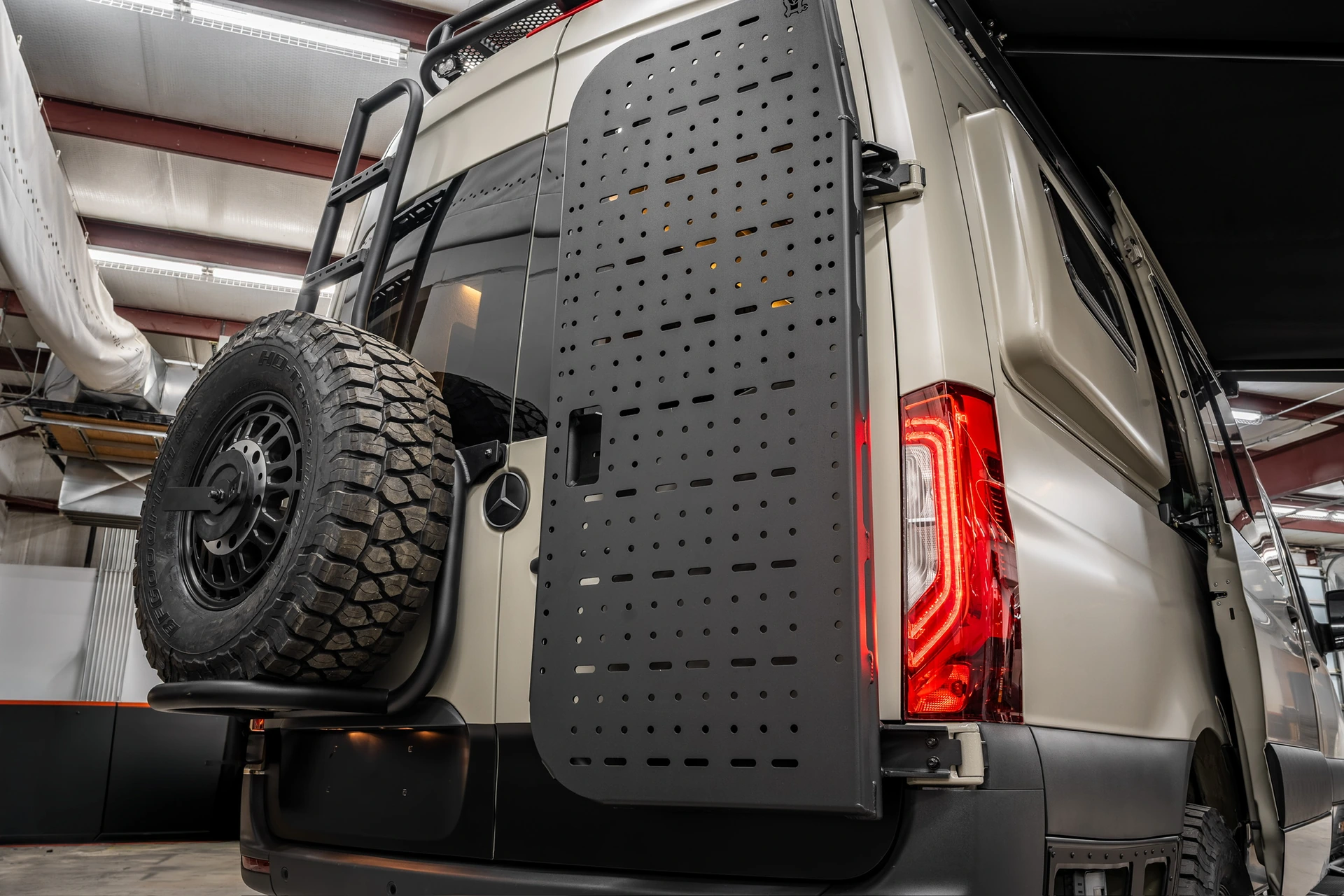 OmegaVan rear doors with spare tire, ladder and equipment mounting panel
